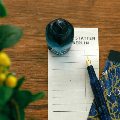 Recycled Glass Paper Weight soda bottle Blue